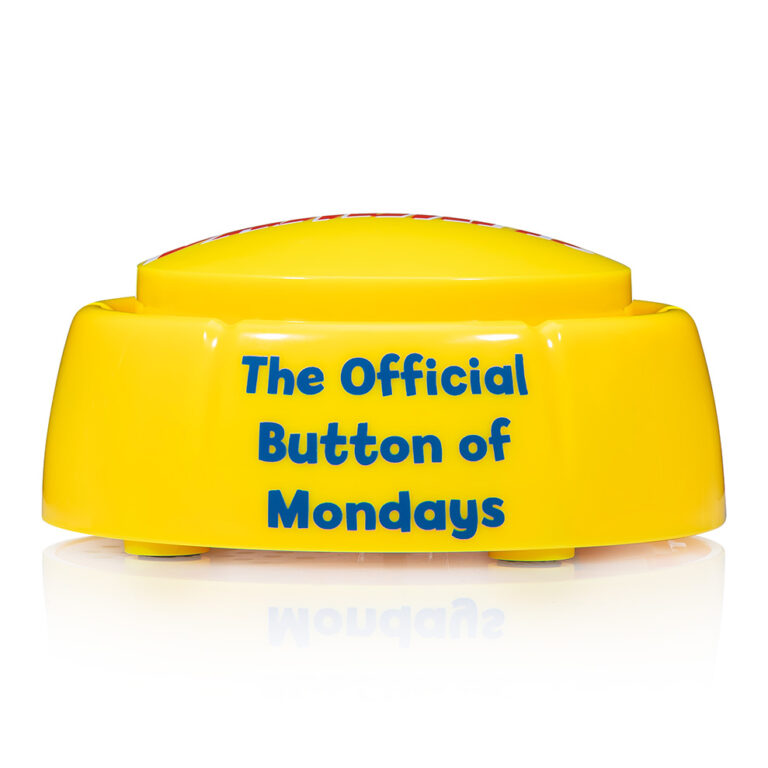 Front view of yellow Dammit Button showing full The Official Button of Mondays slogan